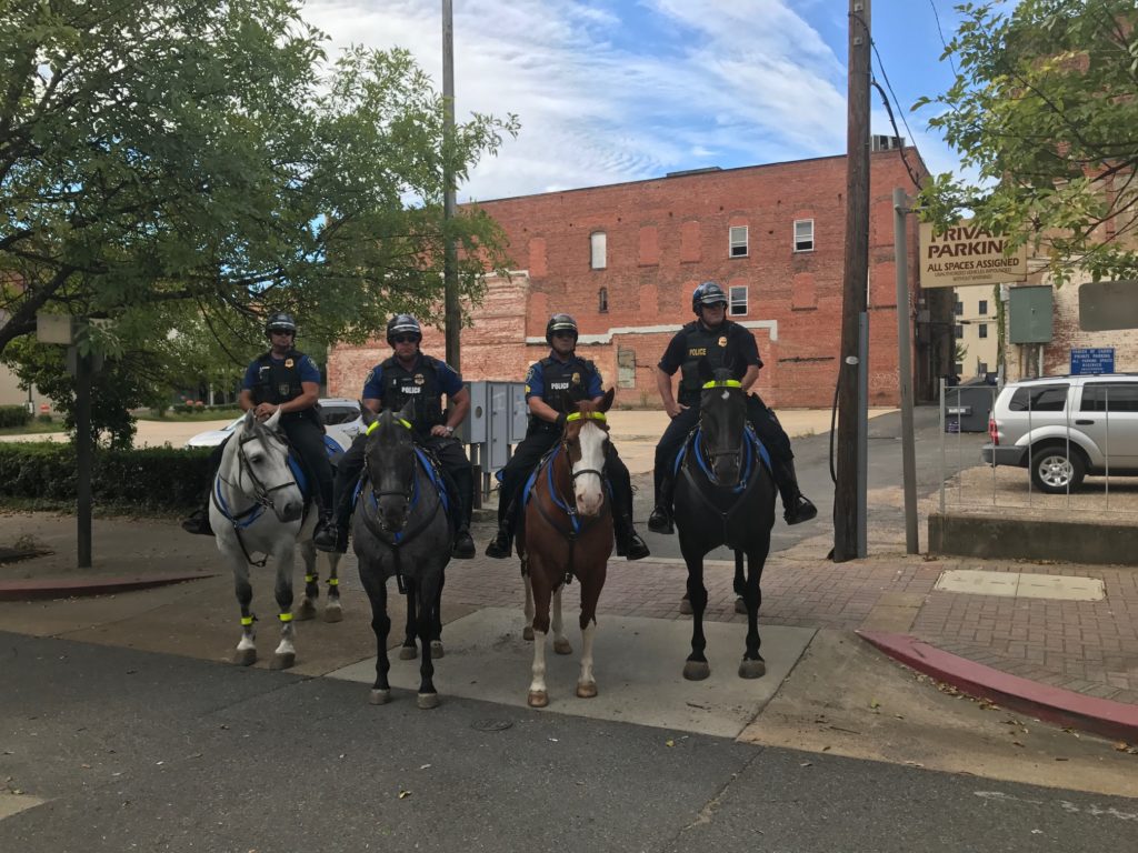 Shreveport police officers on horseback patrol downtown Shreveport Louisiana.